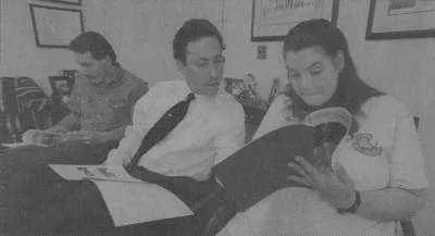 Photo – Don Burk/staff Michael Shorstein (center) has helped Oklahoma couple Larry and Tammy Clifft place two children for adoption.