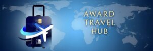 A graphic shows a suitcase with a credit card and airplane silhouette on the left, and the words “AWARD TRAVEL HUB” on the right, set against a blue world map background.