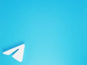 The image-14 design features a white paper plane icon, similar to the Telegram logo, in the bottom left corner on a vibrant blue background, leaving plenty of open space on the right.