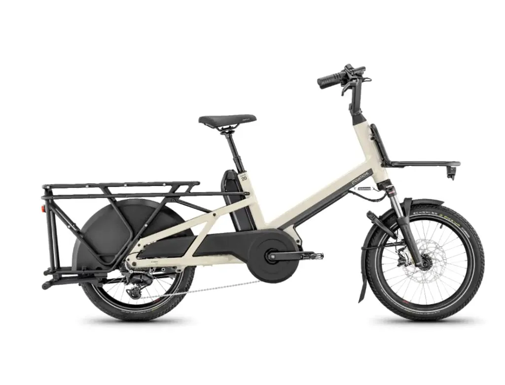 Una moderna bicicleta eléctrica Moustache Lundi 20 Cargo con portaequipajes delantero y trasero, mostrada en un perfil lateral sobre un fondo blanco.
