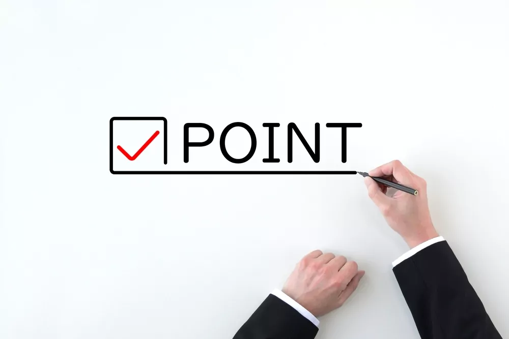 image_Hand,Of,A,Businessman,Drawing,Check,Marks,And,Point,Words