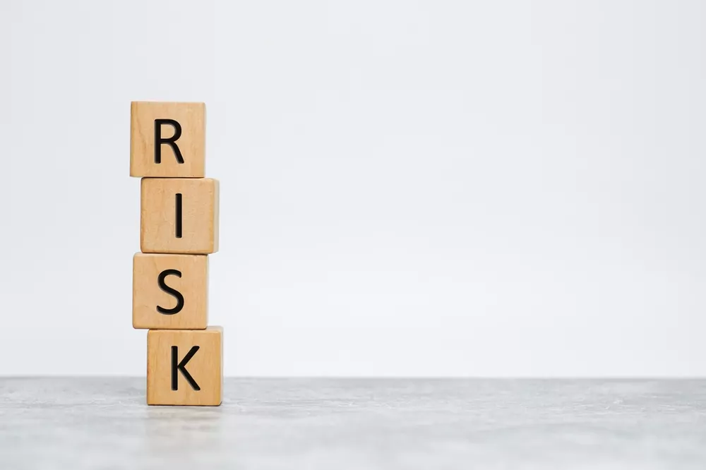 image_Wooden,Cubes,With,The,Word,Risk.,Risk,Taking,,Risk,Management