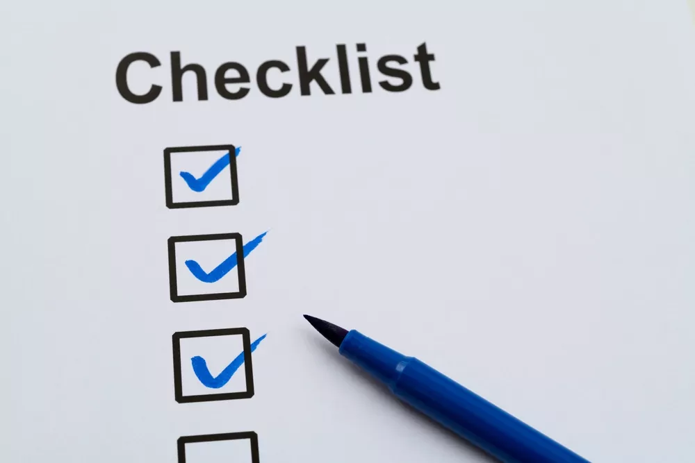image_Blue,Pen,Marking,On,Checklist,Sheet
