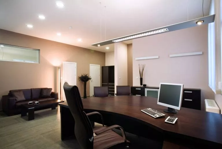 Office cleaning in board room with high end furniture