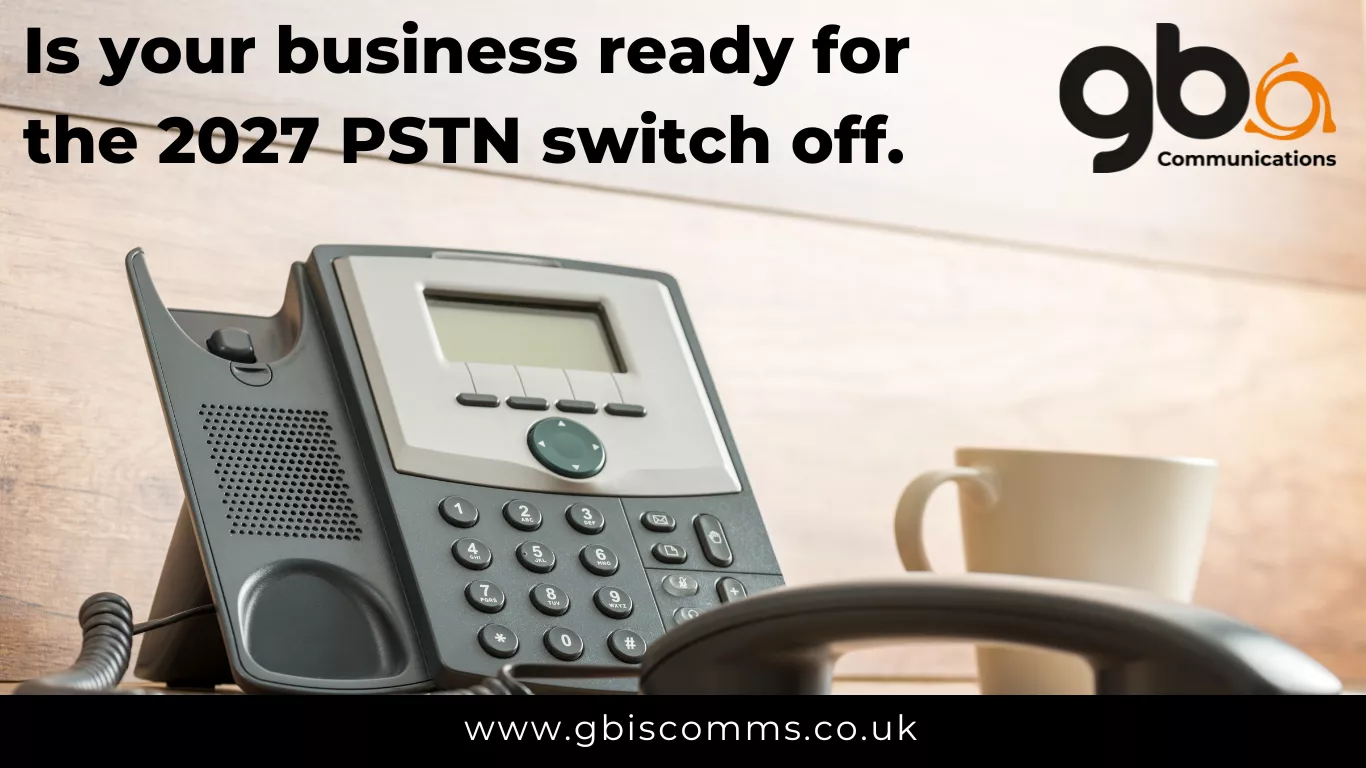 Business phone with a message about the 2027 PSTN switch-off, featuring GB Integrated Systems branding and a coffee cup in the background.