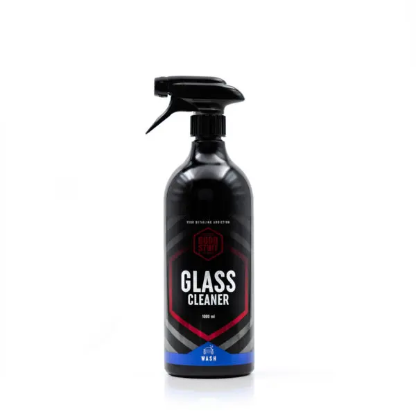 A black spray bottle labeled Glass Cleaner from Good Stuff, featuring a red and blue design, stands upright on a white background—perfect for those seeking quality car wash products.