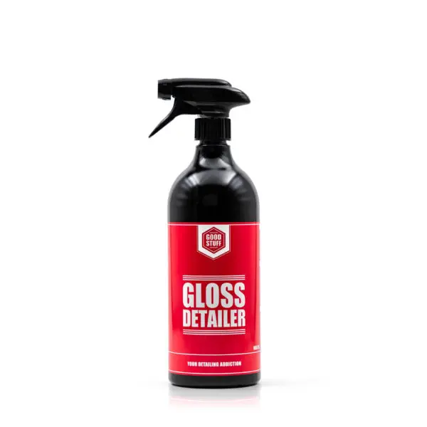 A black spray bottle with a red label that reads Gloss Detailer in large white letters, featuring Good Stuff branding, ideal for exterior car care as a quick detailer, against a plain white background.