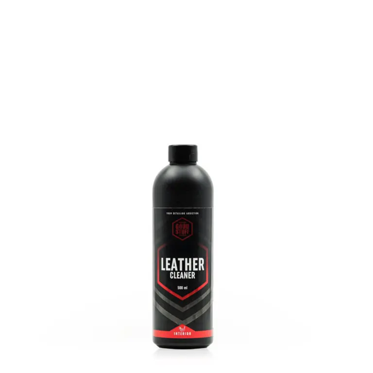 A black plastic bottle labeled Good Stuff Leather Cleaner with a red and gray design, ideal for interior care, stands upright on a white background. The 500 ml bottle features a screw cap and is perfect as your go-to car leather cleaner.