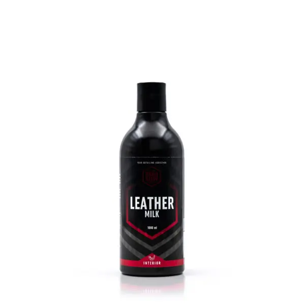 A black bottle of Leather Milk leather conditioner with a red, white, and gray label, shown upright on a white background—perfect for interior car care and considered the Good Stuff among car interior cleaners.