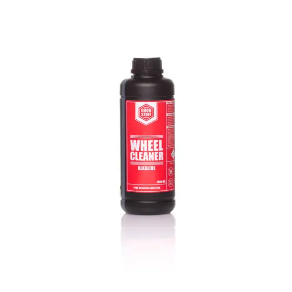 A black plastic bottle labeled Good Stuff Wheel Cleaner Alkaline with a red and white label, standing upright on a white background—an ideal choice among wheel cleaners for effective rim protection.