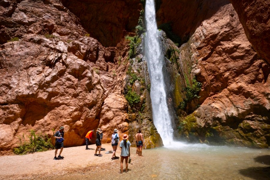 Side Hikes on a Grand Canyon River Trip: What You Need to Know 6 People hiking in Grand Canyon to Deer Creek Falls