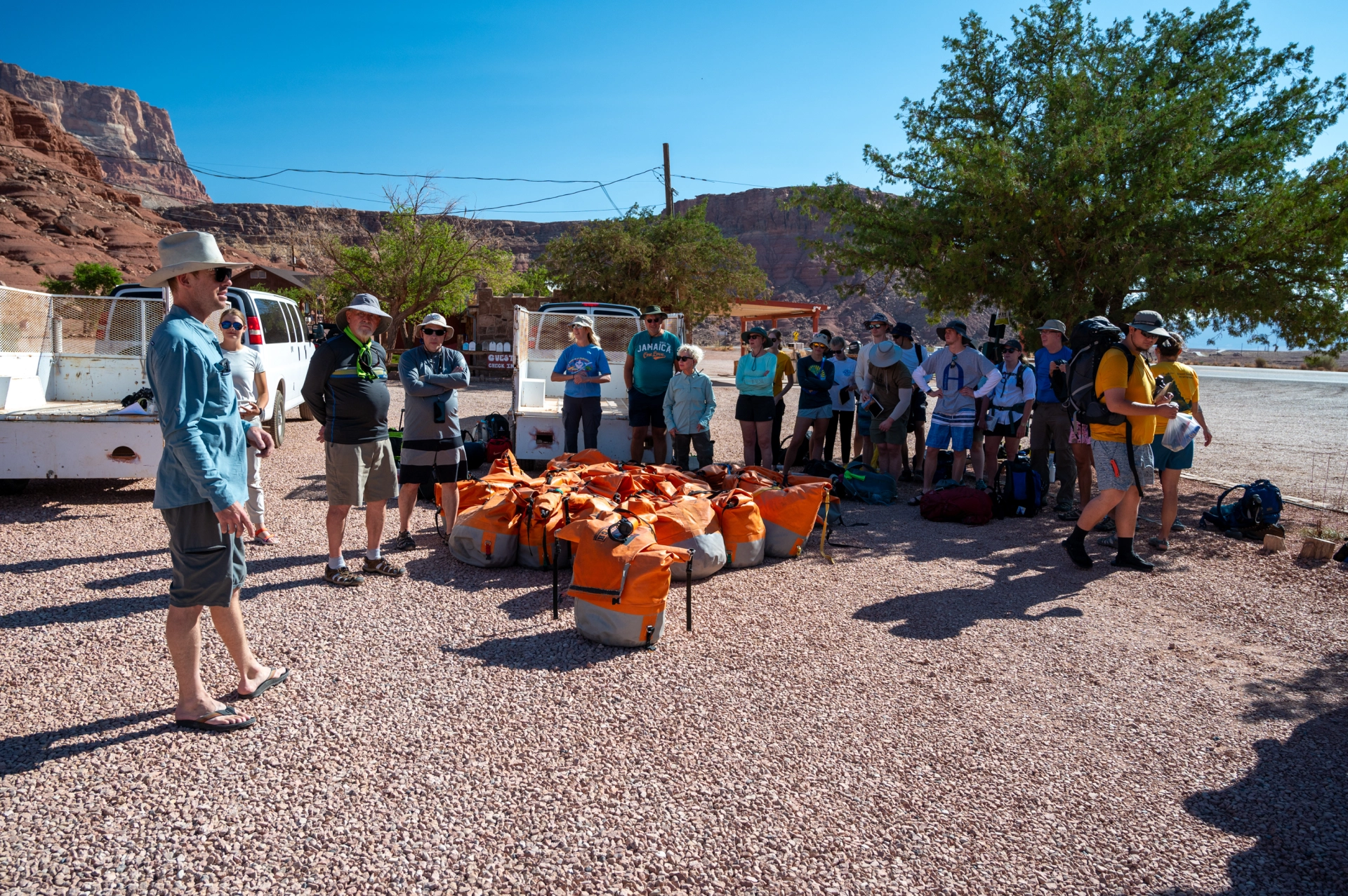 Parke showing dry bags at orientation Hatch employee demonstrating use of as shown in the Hatch's packing guide video.