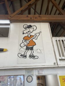 Where does the phrase “River Rat” come from? 1 Hatch river rat picture hanging in warehouse