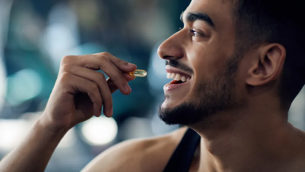 A Young Man Takes Supplement
