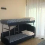 camera 4 persone, letto matrimoniale e letto a castello