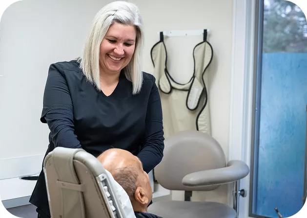 Visit at the Dentist Image of a dentist attending to a patient in a dental clinic