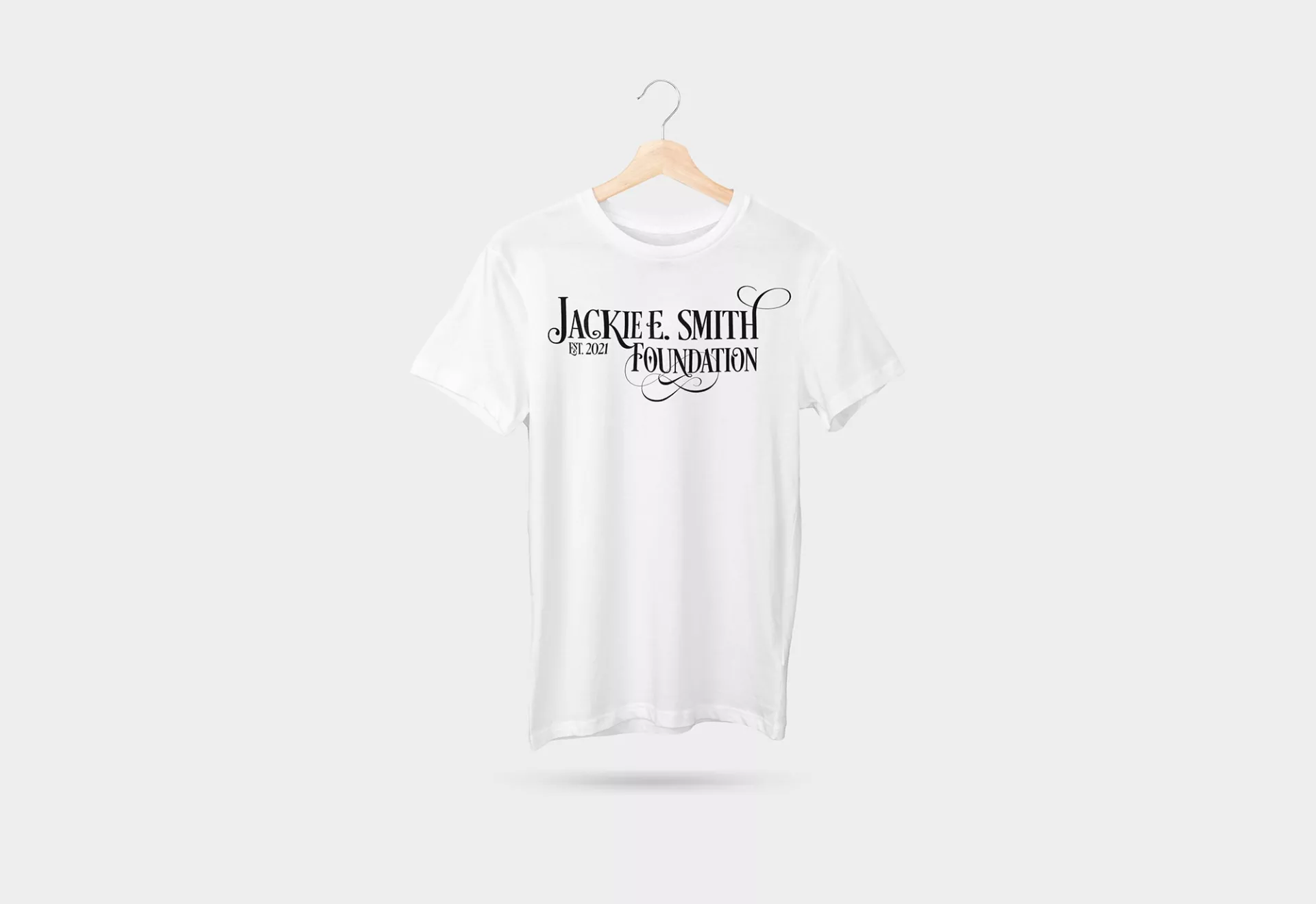 Jackie E. Smith Foundation Logo Design on tee by Matcha Design Jackie E. Smith Foundation Logo Design on tee