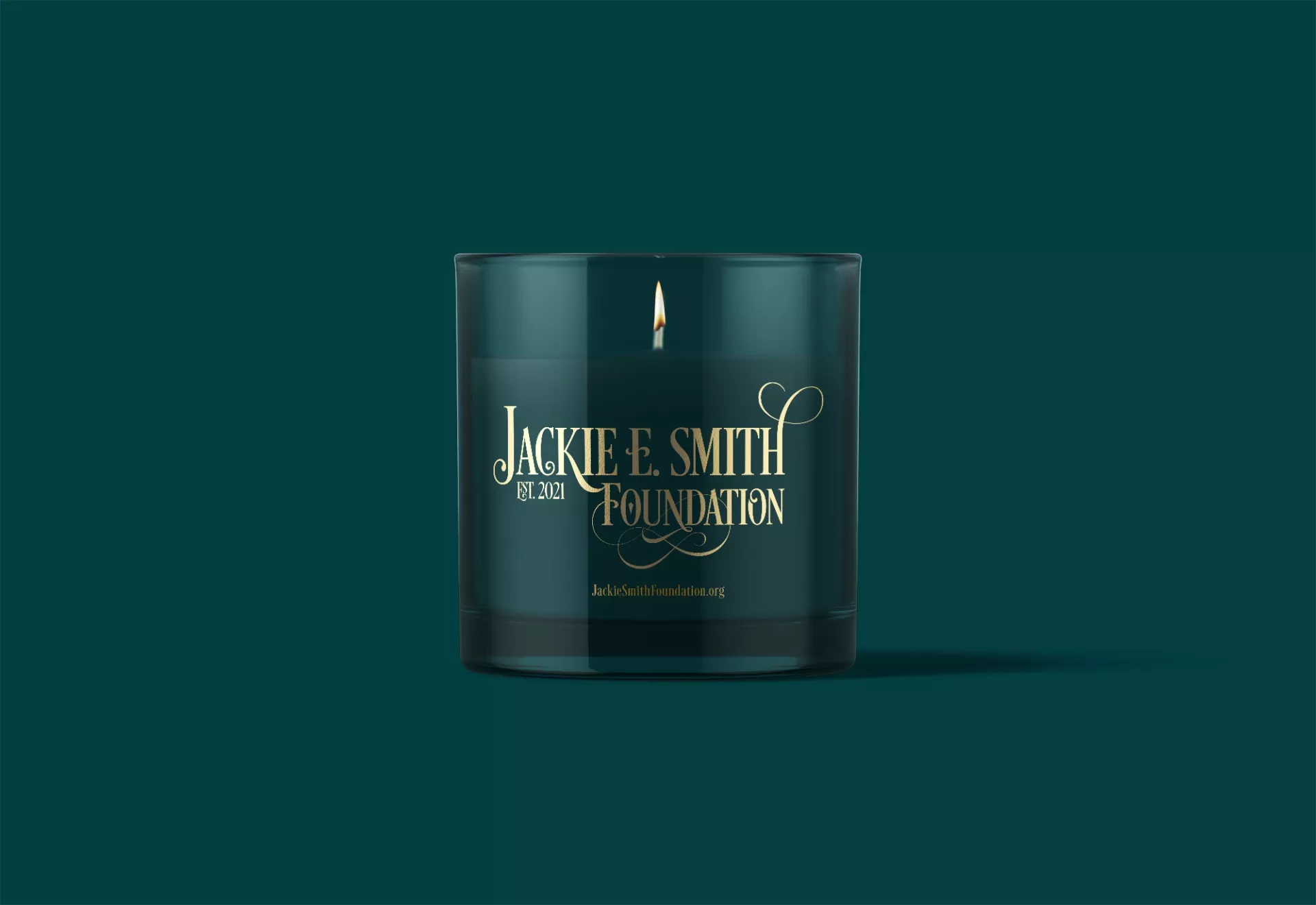 Jackie E. Smith Foundation Logo Design on candle by Matcha Design Jackie E. Smith Foundation Logo Design on candle