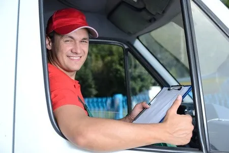smiling delivery guy from miami movers