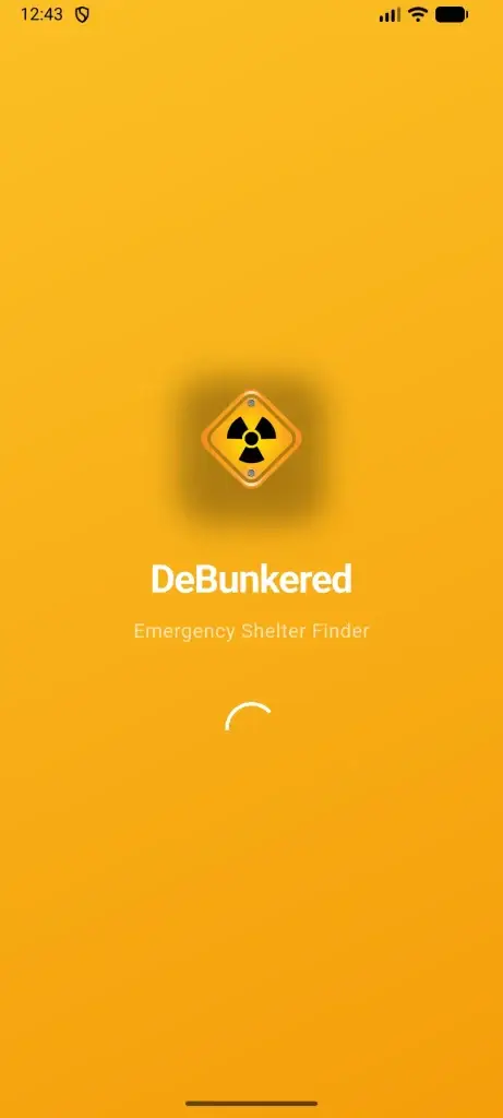 Why We Built DeBunkered: Applying Startup Agility to Humanitarian Needs 1 DeBunkered emergency shelter finder app splash screen showing nuclear hazard icon and loading interface