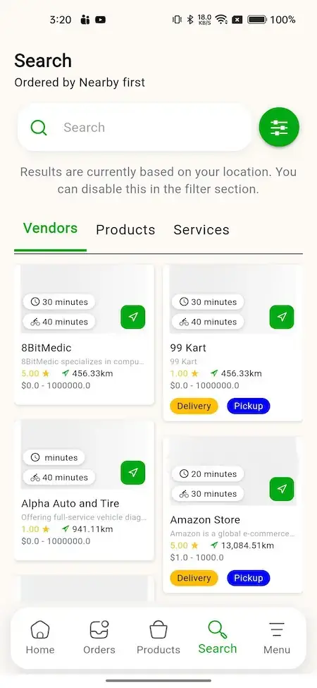 Gojek Clone 17 **Alt Text:** A screenshot of a mobile app's search results page, displaying various vendors and their products.**Title:** Search Results Page**Caption:** The page shows a list of vendors with their products, including 8BitMedic, Alpha Auto and Tire, 99 Kart, and Amazon Store.**Description:** This image is a screenshot of a mobile app's search results page. The page displays a list of vendors with their products, including 8BitMedic, Alpha Auto and Tire, 99 Kart, and Amazon Store. Each vendor has a brief description, price, and rating. The page also includes a search bar at the top and navigation buttons at the bottom. The background of the page is white, with green accents used for highlights and buttons. Overall, the image suggests that the app is a marketplace or e-commerce platform where users can search for and purchase products from various vendors.
