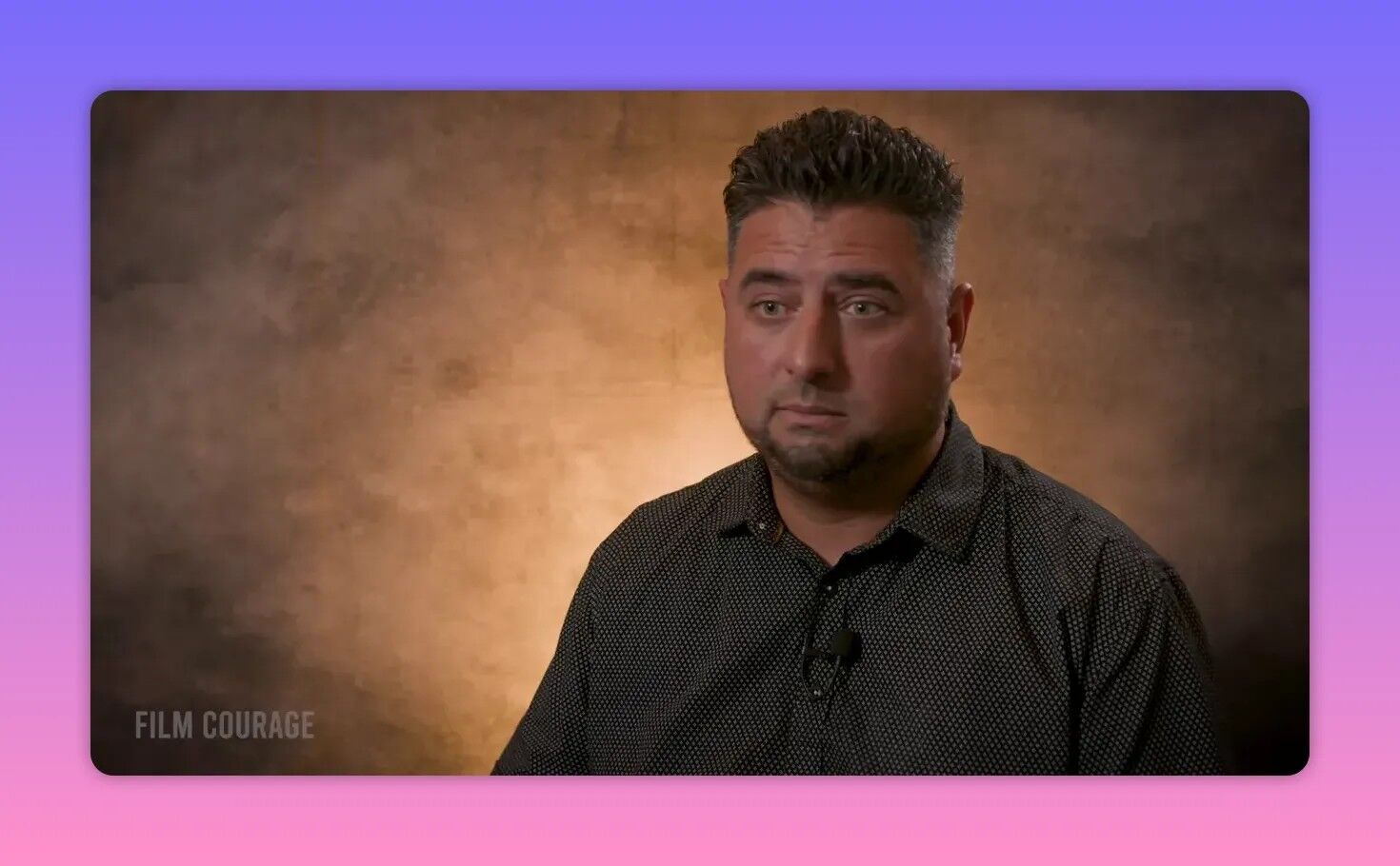 Clear head-and-shoulders interview portrait of a filmmaker against a warm backdrop giving practical advice about permits.