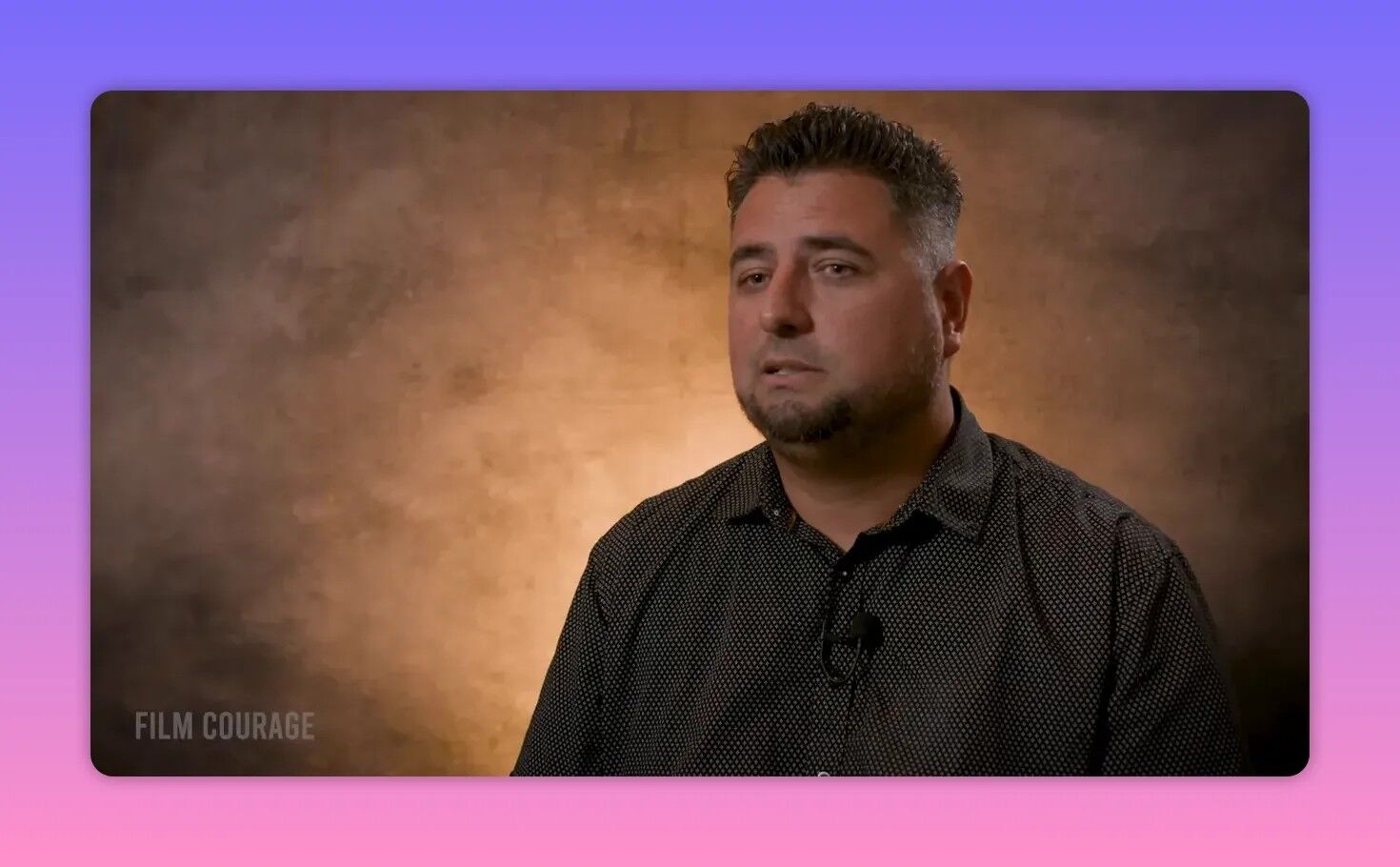 Clear interview portrait with warm textured backdrop showing a filmmaker explaining why he used $5,000 to make a feature.