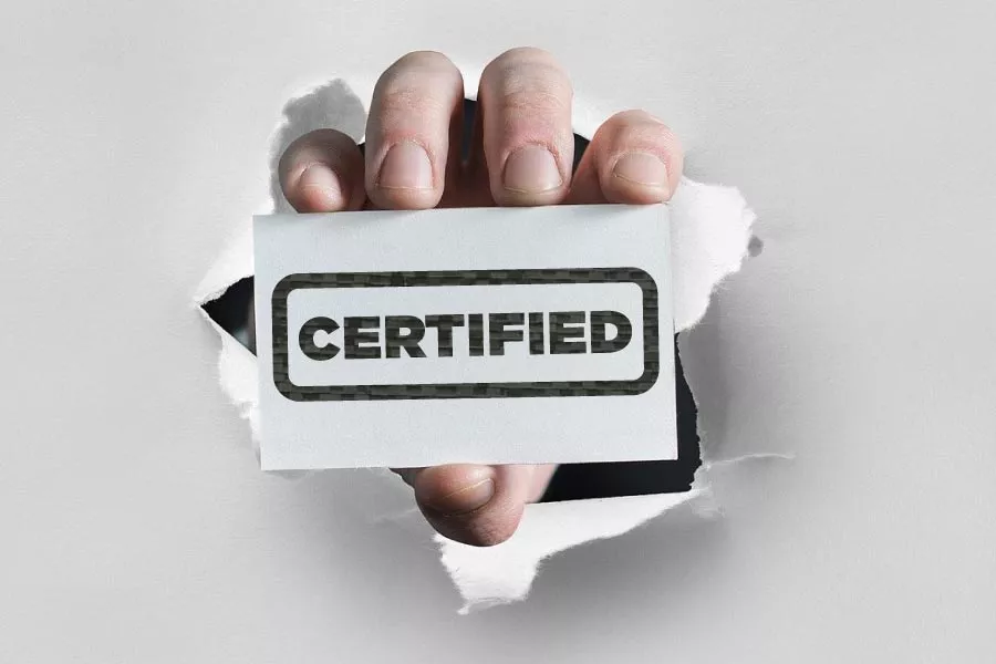 Business card with a "CERTIFIED" stamp illustrating trustworthy roofing contractors in San Marcos TX