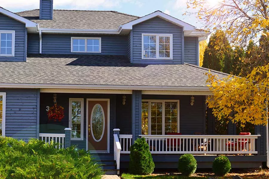 Suburban home with a roof installed by a Kyle TX roofing company