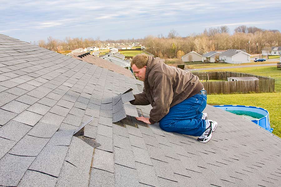 Homeowner Attempting to repair a roof without the help of a Kyle TX roofing company