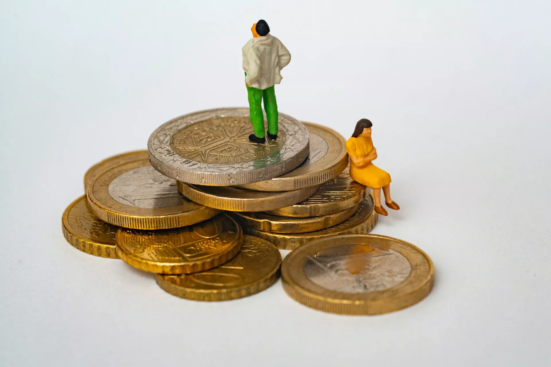 figurines on top of coins