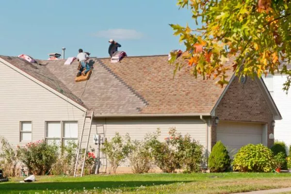 roofers making quick work of a roof repair
