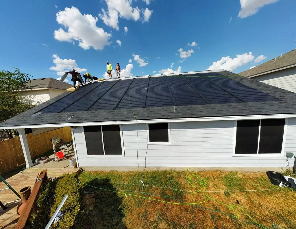 Kyle solar panel installation on house roof