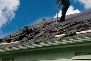 a man working on a roof repair in Round Rock house