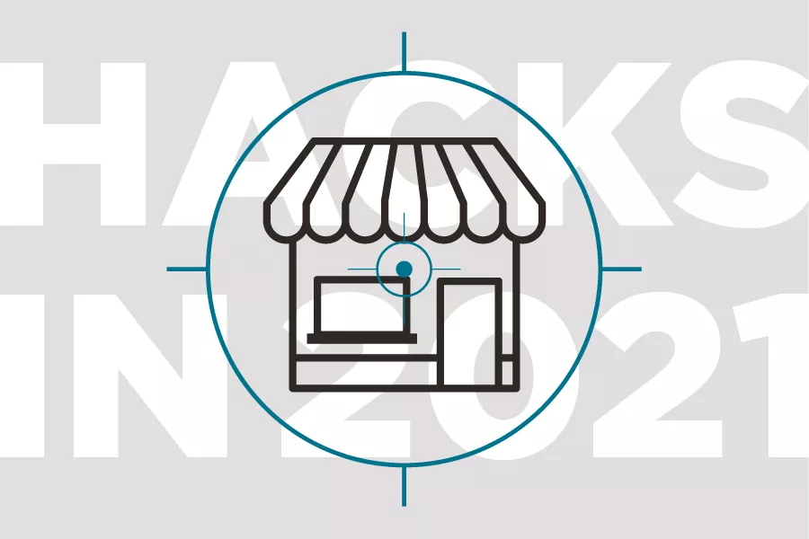 An icon of a business in the crosshairs of a hacker.