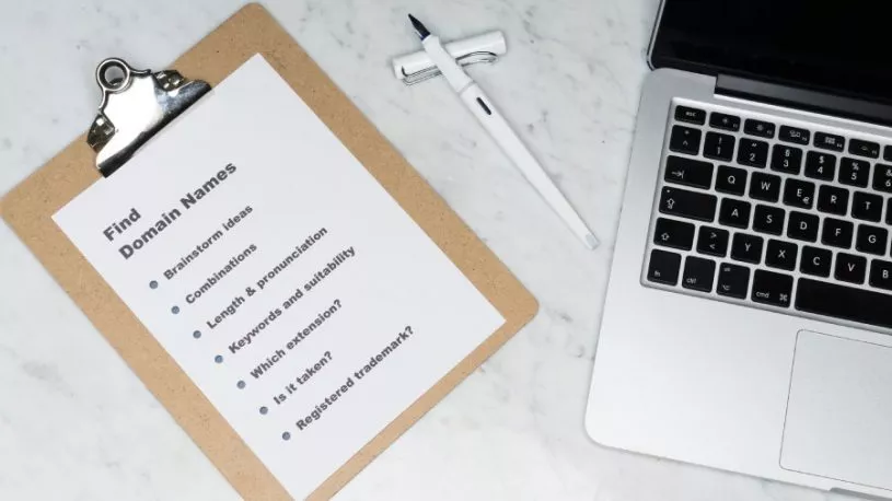 checklist on a clipboard for the different questions to ask when getting a new website domain