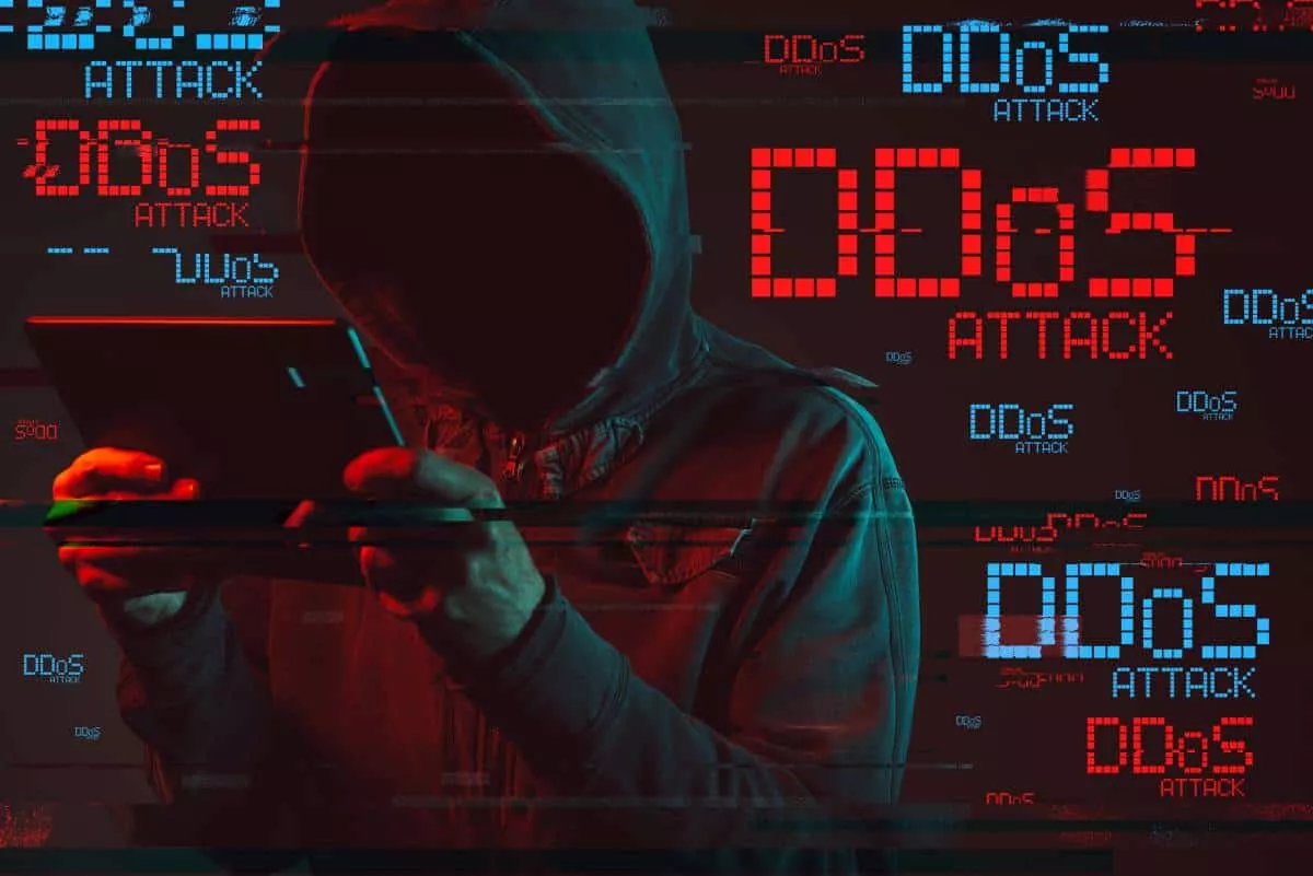 Hacker ready to DDoS attack a business
