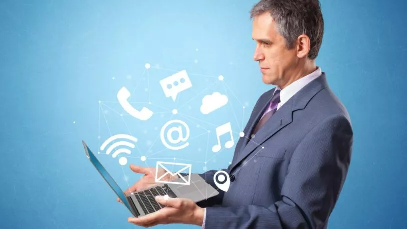 a Man with a tons of new clients notifications after parenting with San Marcos SEO consultants