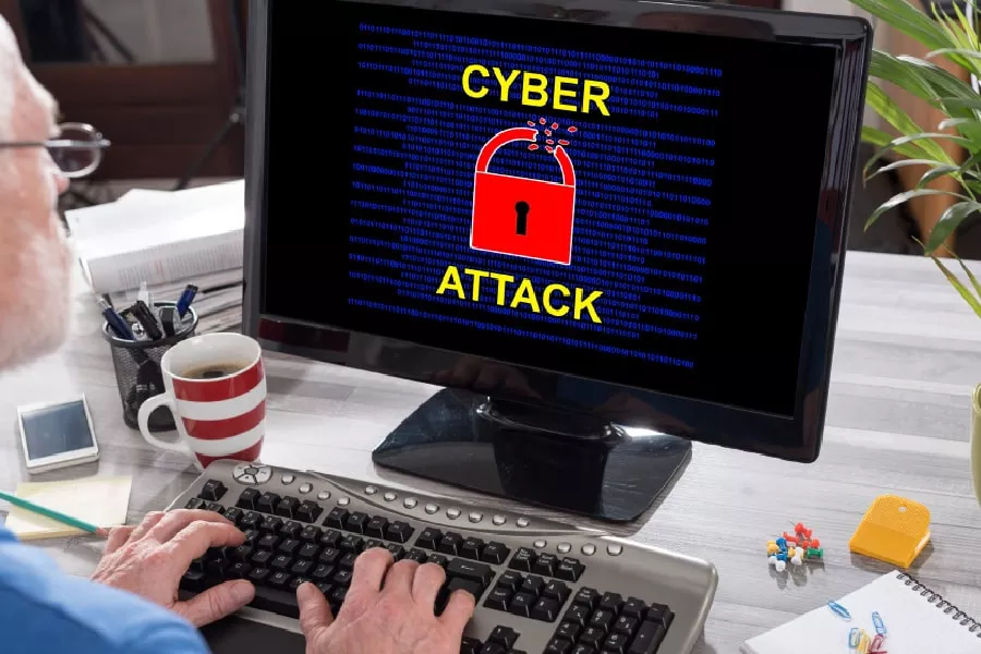 A man using San Antonio cybersecurity services to help combat a cyber attack.