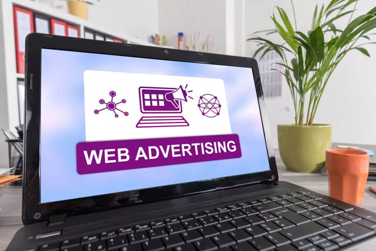 Laptop screen displaying an Austin online marketing webinar on web advertising.