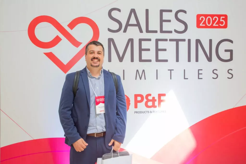 P&F Brazil team member standing for a photo at the 2025 Sales Meeting