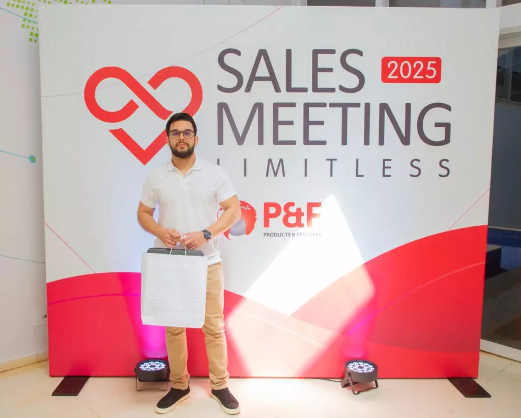 P&F Brazil team member standing for a photo at the 2025 Sales Meeting