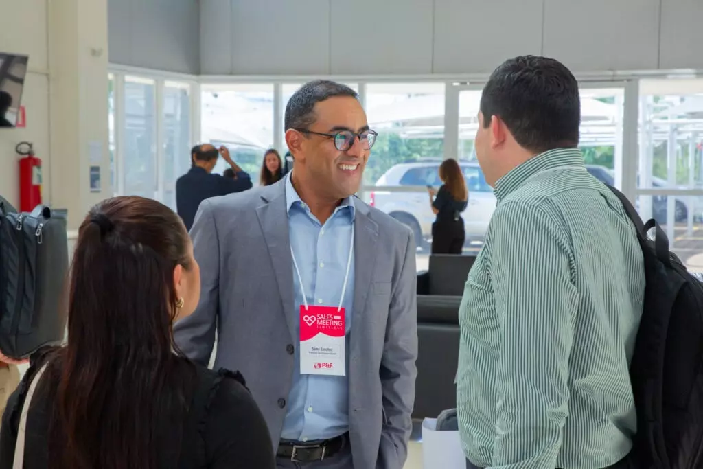 P&F Brazil team members having a conversation at the 2025 Sales Meeting