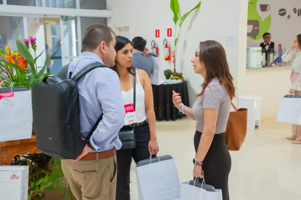 P&F Brazil team members having a conversation at the 2025 Sales Meeting