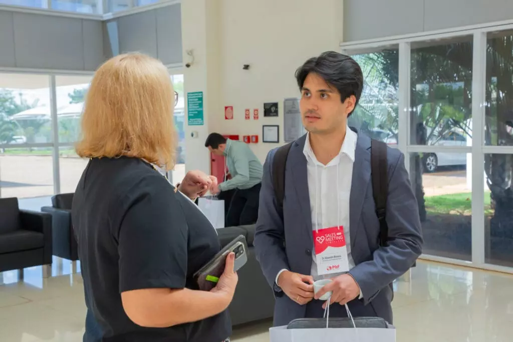 P&F Brazil team members having a conversation at the 2025 Sales Meeting