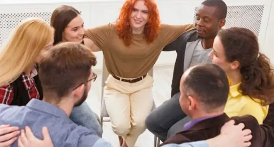 A group of people discussing youth mental health importance at Renaissance Behavioral Health in Cleveland, Ohio