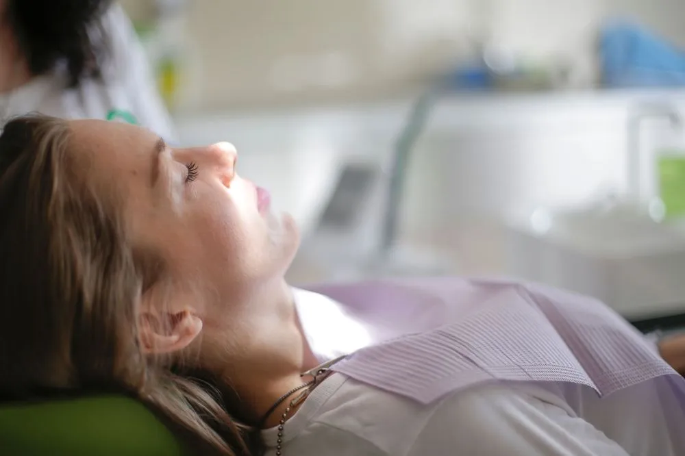 Botox for Chronic Migraines in Grand Prairie, TX 4 Relaxed patient resting after a minimally invasive chronic migraine treatment session