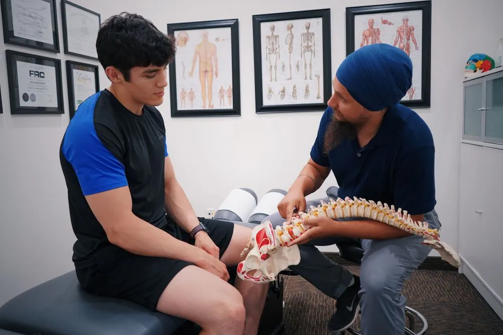 Botox for Chronic Migraines in Plano, TX | Relief Guide 1 Patient discussing chronic migraine symptoms with pain management doctor in Texas clinic