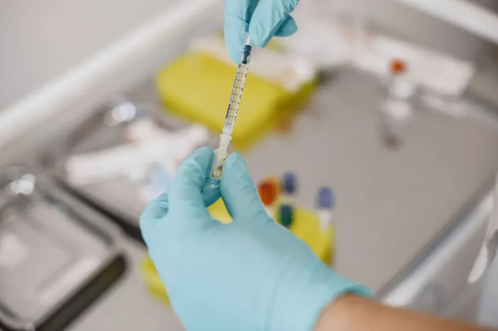 Selective Nerve Root Block in Plano, TX | Non-Surgical Options 2 Physician performing a fluoroscopy-guided nerve root block injection in a clinical setting