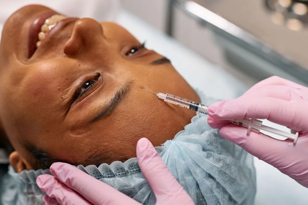 Suzetrigine & Botox for Chronic Migraines in Grand Prairie, TX 3 Medical professional administering Botox injection for chronic migraine prevention treatment